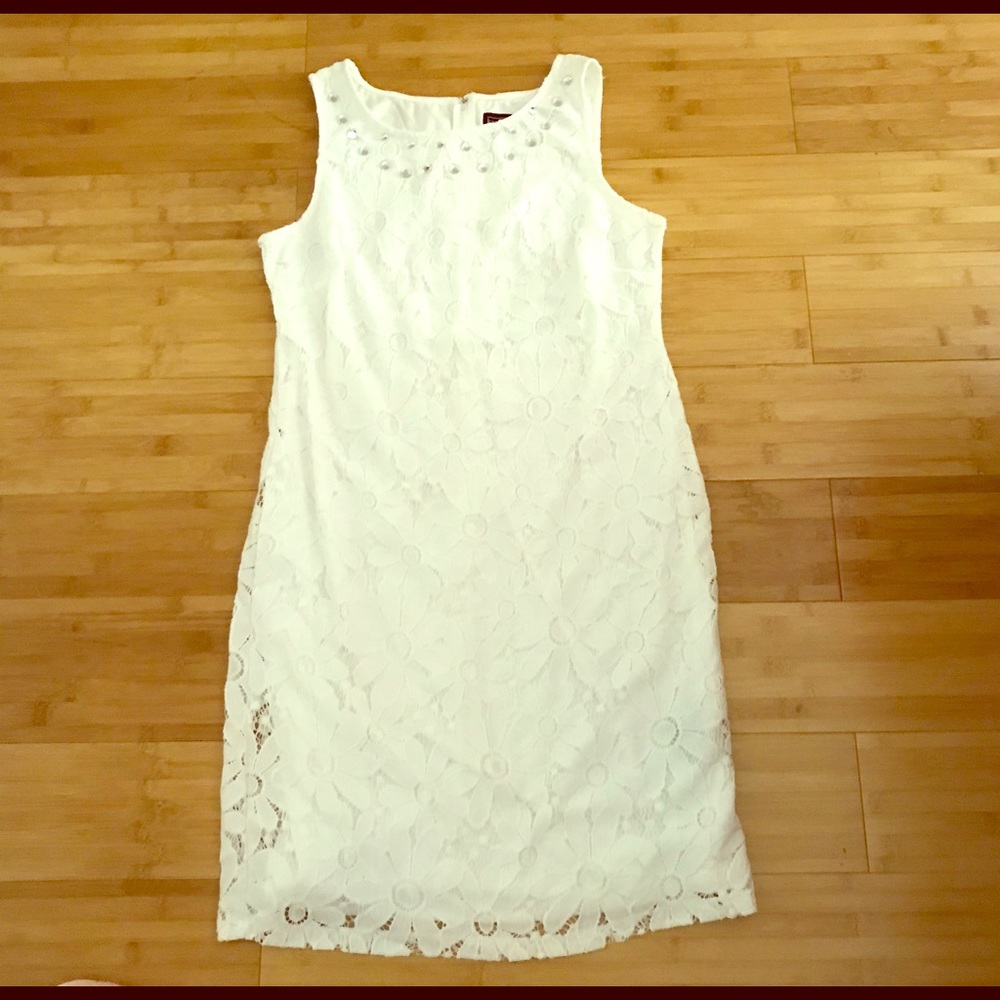Karin Stevens white lace dress